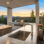 Modern outdoor plumbing Sydney backyard with outdoor kitchen, BBQ area, and premium plumbing fixtures for summer entertaining