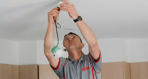 Professional electrician installing and repairing indoor and outdoor lighting solutions across Sydney