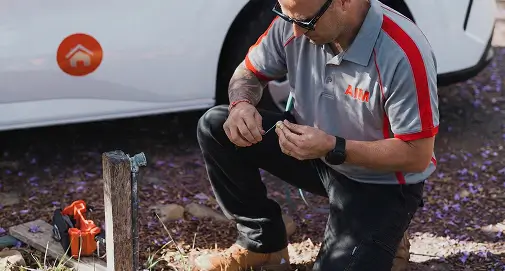 Professional plumbing specialist installing kitchen plumbing fixtures for homes and businesses across Sydney