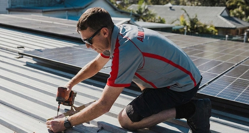 Professional electrical maintenance specialist inspecting and servicing home electrical systems in Sydney