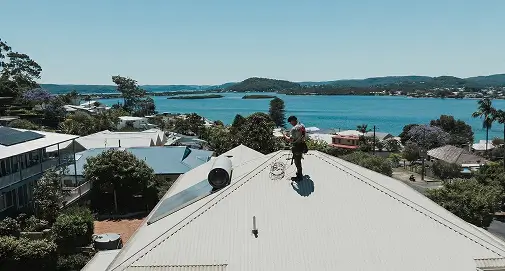 Professional roofing experts repairing and replacing roof tiles for long-lasting performance across Sydney
