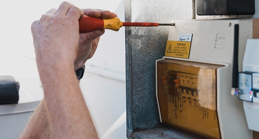 Professional electrician installing upgraded switchboards to improve electrical safety and performance in Sydney
